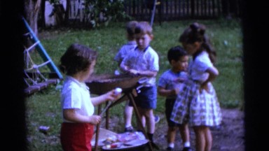 1963: children are seen having fun in a garden area CAMDEN, NEW JERSEY