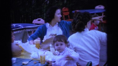 1963: a picnic in a garden area is seen CAMDEN, NEW JERSEY