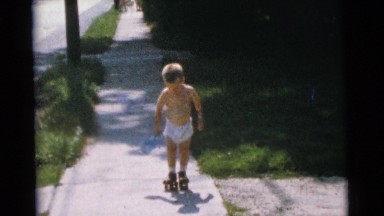 1963: a topless kid is seen pouring in a pot CAMDEN, NEW JERSEY