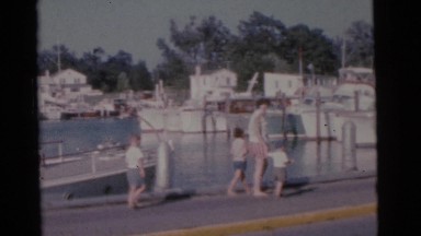 1963: family enjoying a beautiful sunny day together out on the boat. CAMDEN
