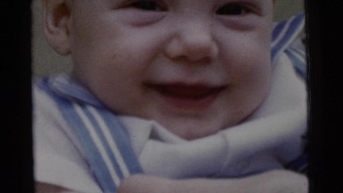 1961: a toddlers is seen crawling DETROIT, MICHIGAN