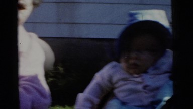 1961: two beautiful babies wearing hats. DETROIT, MICHIGAN