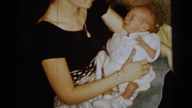 1961: comforting a baby DETROIT, MICHIGAN