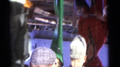 1963: young boy playing with a fun house mirror CAMDEN, NEW JERSEY