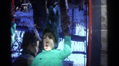 1963: a child is seen behind a glass CAMDEN, NEW JERSEY