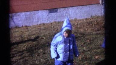 1963: three children in matching outfits, playing in the yard CAMDEN, NEW JERSEY
