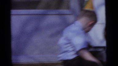 1963: kids are playing with the left items of the birthday celebration caps