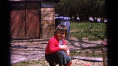 1963: two cute kids outdoors standing and squatting on the lawn CAMDEN