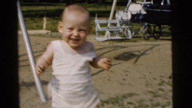 1961: a baby walking in the playground DETROIT, MICHIGAN