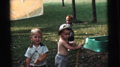 1961: busy children working on the ground with shovels in hand DETROIT, MICHIGAN