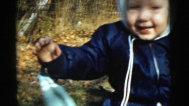 1961: a toddlers is seen crawling DETROIT, MICHIGAN
