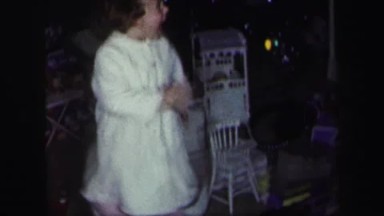 1974: happy little girl celebrating christmas LYNBROOK, NEW YORK