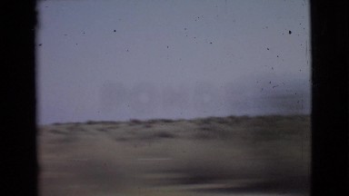 1968: driving along a desert road. COTTONWOOD, ARIZONA