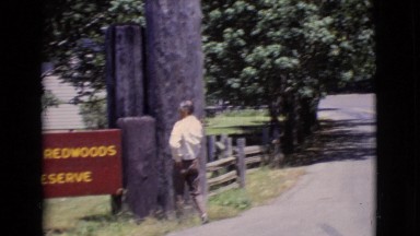 1968: man at sign for a park COTTONWOOD, ARIZONA