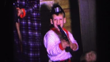 1974: Three Young Boys in Pajamas Playing with Toy Guns in Lynbrook, New York