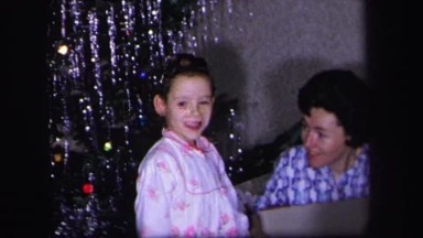 1974: kids showing off their new presents. LYNBROOK, NEW YORK