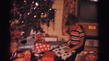 1961: boys are opening their christmas presents CLARKSDALE, ARIZONA