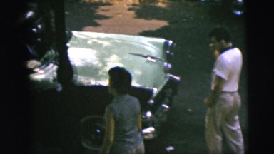 1962: people are seen in a tourist area and are observing a building CAMDEN
