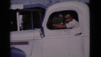 1964: a man is seen driving COTTONWOOD, ARIZONA