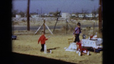 1968: children are seen having fun in a garden area CLARKSDALE, ARIZONA