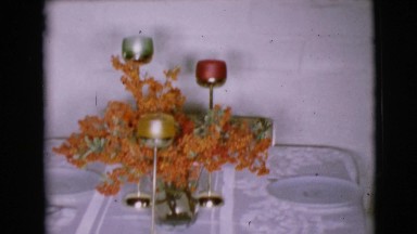 1968: the boy speaking to his father sitting in the sofa at his home
