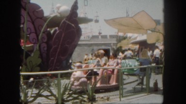 1962: family is enjoying a day at the park during a vacation together.