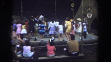 1962: children are seen having fun in a garden area SAN PEDRO, CALIFORNIA
