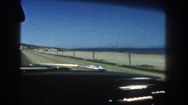 1962: the beach and ocean as seen from a moving vehicle DISNEYLAND, CALIFORNIA