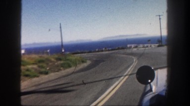1962: mounted camera video of car driving DISNEYLAND, CALIFORNIA