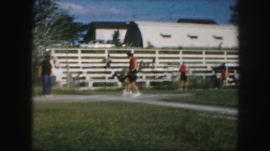 1958: baseball player swings bat twice and is tagged out during women's game.