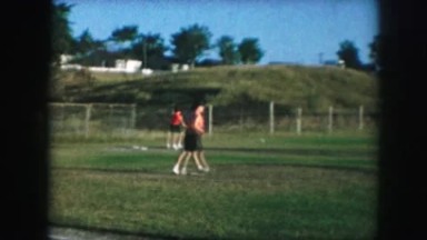 1958: a baseball player runs to third base and home plate during a game.
