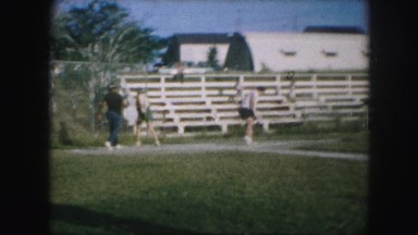 1958: girls are playing baseball AMES, IOWA