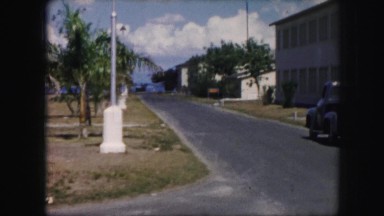 1958: at a harbor town a sea plane takes off in the water flies
