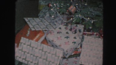 1958: santa leaves plenty of gifts under the tree AMES, IOWA