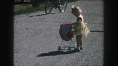 1958: a small girl is seen happy and walking AMES, IOWA