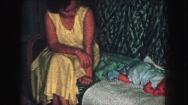 1958: a mother with a small child is seen AMES, IOWA