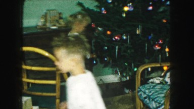 1958: children are seen around a christmas tree AMES, IOWA