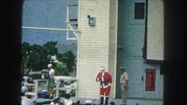 1958: a man dressed as santa claus talking to the public in a show AMES, IOWA