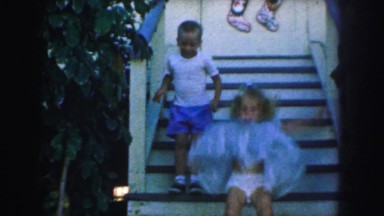 1958: gorgeous little girl and his brother getting fun in a simple way AMES