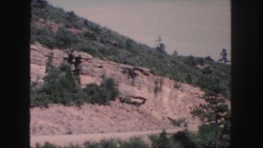 1958: road trip dry desert cliffs stop smoke break vista view overlook COLORADO