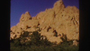 1958: perfect sun on natural rock formation western roadtrip travels COLORADO