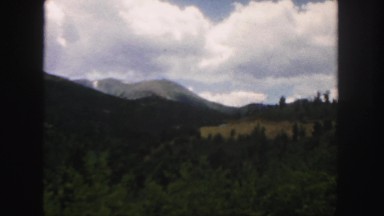 1958: beautiful nature with mountains, forests, sky, clouds, valleys etc.