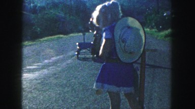 1958: children are seen having fun in a garden area AMES, IOWA