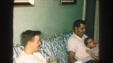 1958: family sitting in the living room on the eve of xmas AMES, IOWA