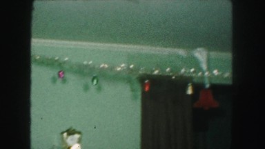 1958: beautifully decorated room with illuminated x-mas tree AMES, IOWA
