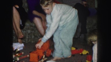 1958: children are seen indoors playing AMES, IOWA