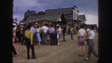 1958: people are seen in a tourist area and are observing a building COLORADO