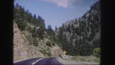 1958: traveling through the mountains on a windy road leading to nowhere