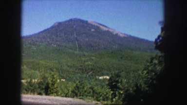 1958: large mountain under the blue sky beyond amazing greenery COLORADO