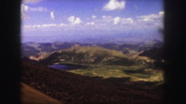 1958: Riding by Rail or Road, Steep Slope Overlooking Valley, Lakes